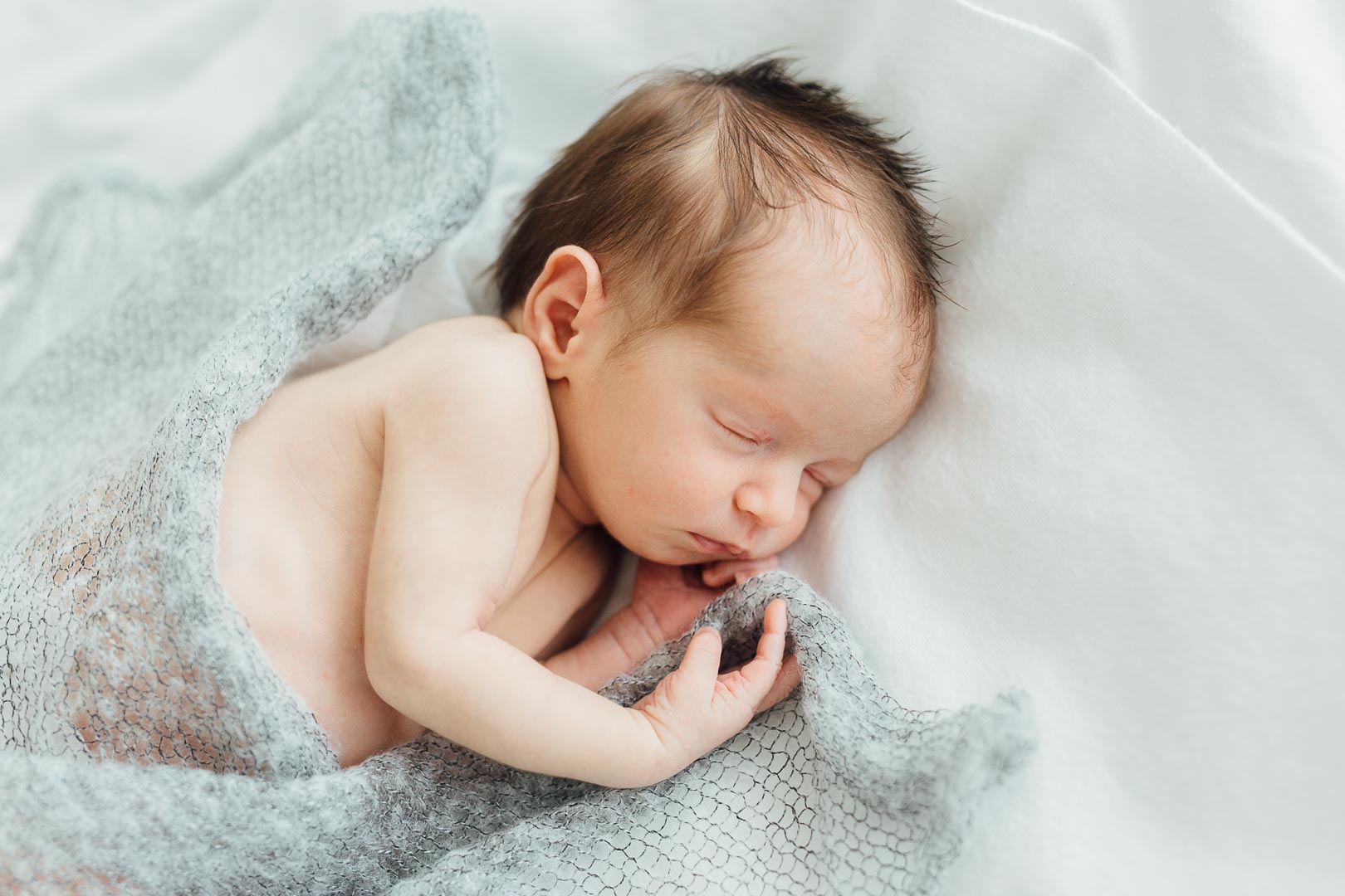 Newbornfoto eines schlafenden Babys